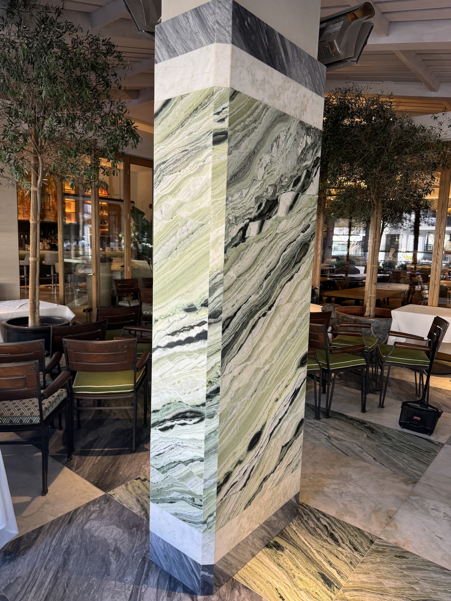 Green marble column installation